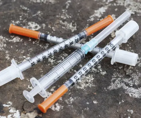 assortment of syringes