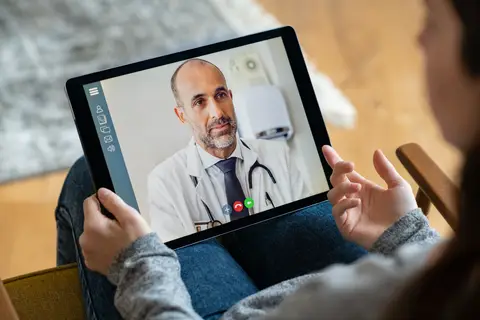 girl videocalling doctor