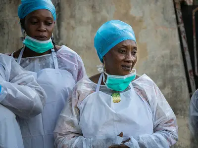 Women health workers receive training in triage practices.