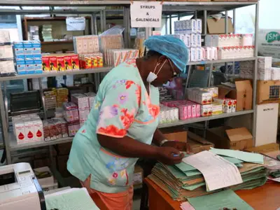 nurse looking over paperwork