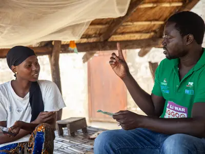 Man talking to woman