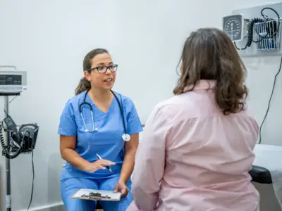 Doctor consults patient