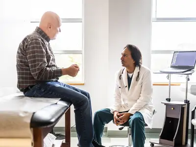Doctor consults patient