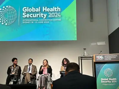 Photo of a panel of people onstage at the Global Health Security 2024 conference