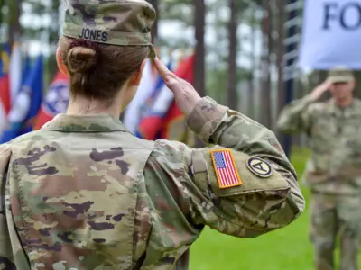 Service member salutes