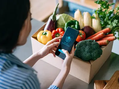 Woman ordering food from her smart phone. 