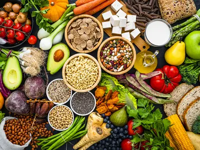 A variety of food, including beans, seeds, vegetables, fruits, gains