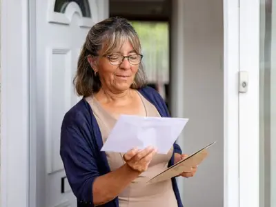 Woman looking at mail