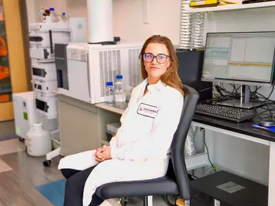 Samantha Blake sitting in lab space