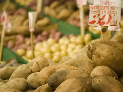 Sweet potatoes in a vegetable stand