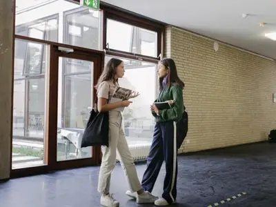 Students talking in hallway