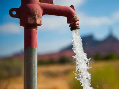 Water flowing from an outdoor spigot
