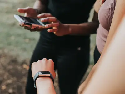 Person checking wearable watch