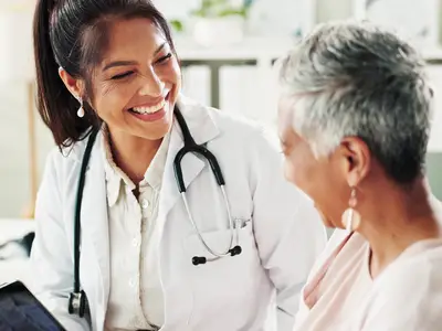 Primary Care Doctor with Patient