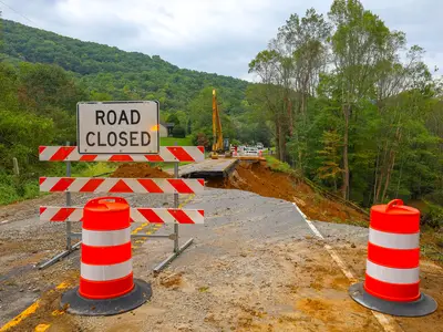 Road closed sign due to flood damage