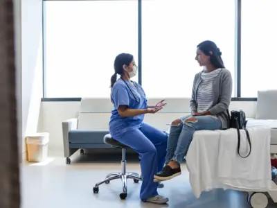 Doctor talks to patient