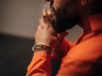 Person in handcuffs