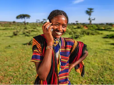 woman in ethiopia conducting business on cellphone