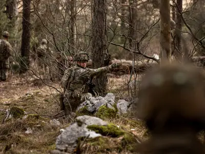 Paratroopers prepare for a training exercise