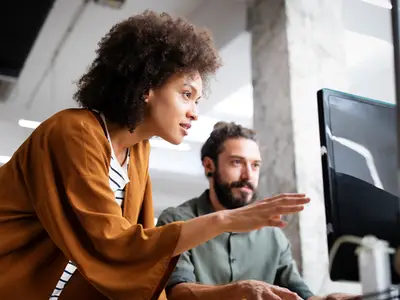 People working at computer