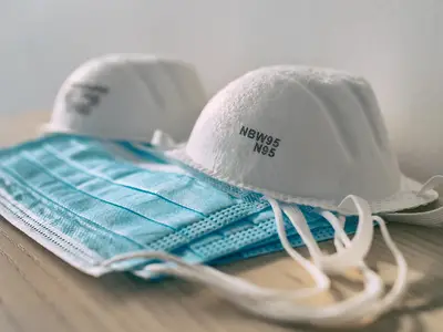 A collection of surgical and N95 face masks.