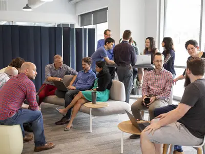 RTI's data scientists work together in a collaboration space.