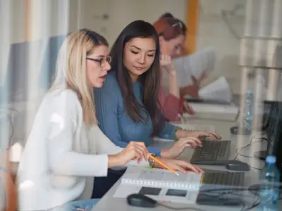 Women collaborating at a computer