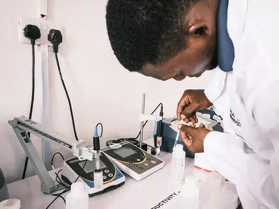 A Nigerian scientist working on water, sanitation, and hygiene