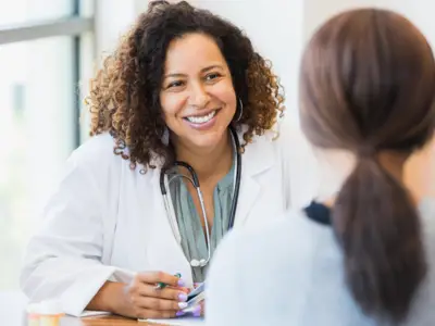 Doctor consults with patient