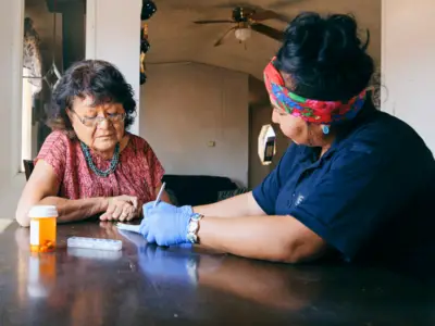 two women addressing healthcare