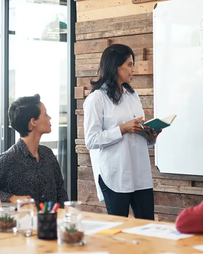A team of colleagues plan their next project.