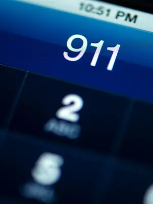 Photo of phone display dialing 911.