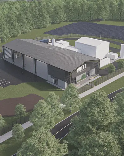 Graphic drawing of new RTI Pilot Xcelerator. Large building with open space and field with solar panels.