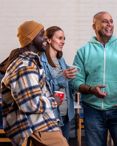 People standing in a group talking