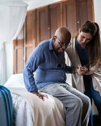 Photo of caregiver and elderly person