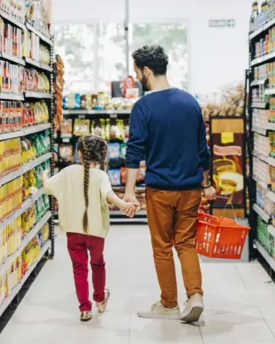 Photo of a parent and child at the grocery store