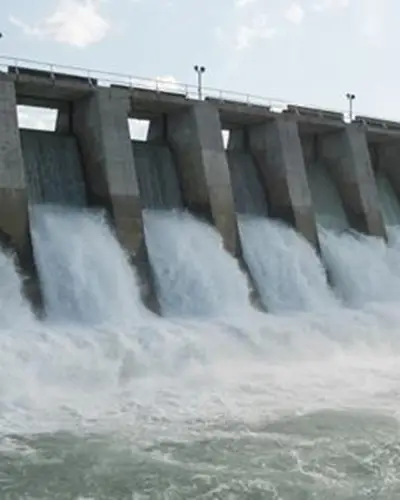 Man-made dam with water flowing through it