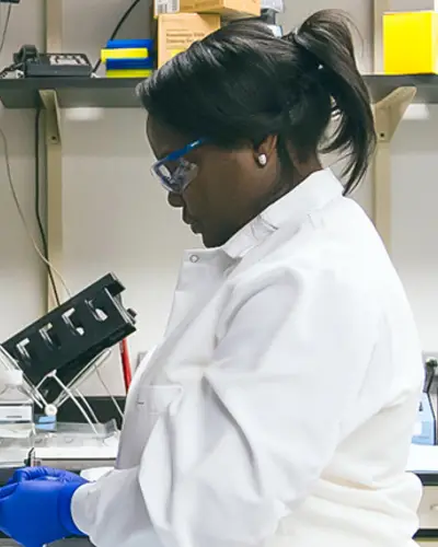 A technician works in the lab