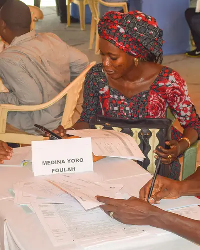 Partners meet at a Senegal GOLD forum to discuss priority investments for local communities.
