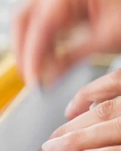 hands sorting document files 