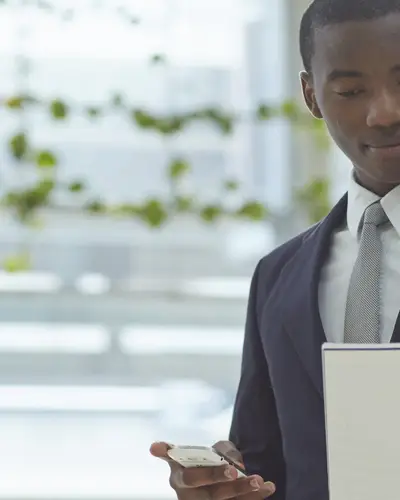 man reviews a document