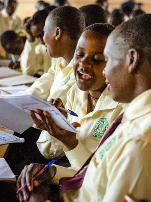 Student teachers follow an English reading lesson at Ndegeya Primary Teachers College in Masaka, Uganda. © Katie G. Nelson for RTI International.