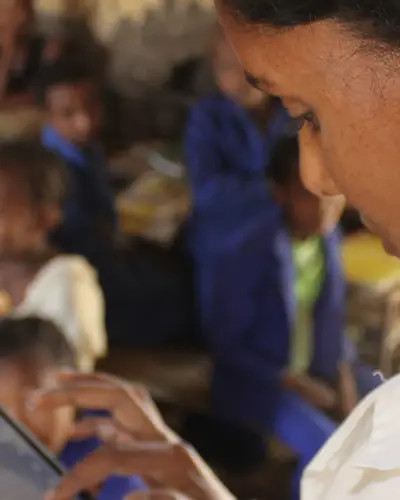 A teacher and students in Ethiopia