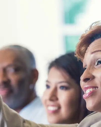 Adult students participate in classroom discussion