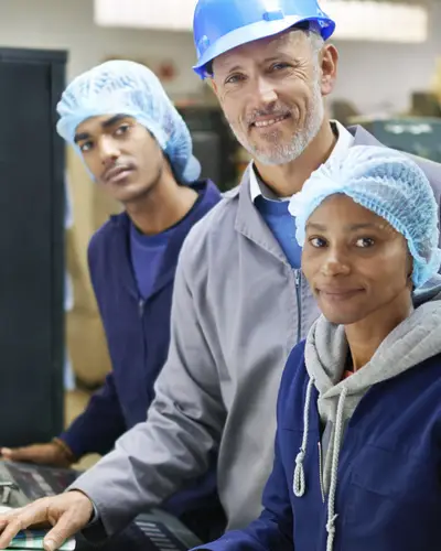 apprentices and instructor in a print shop