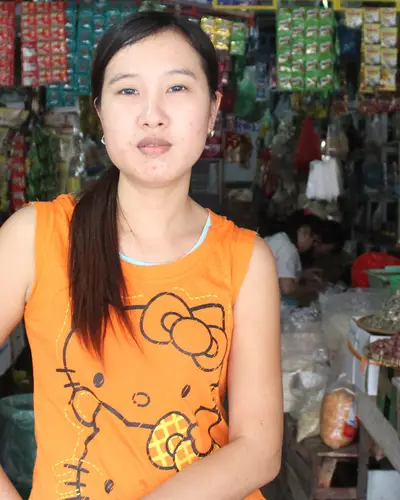 A woman shop owner in Asian market