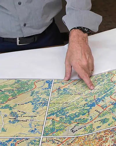 our GIS experts examine large-format maps
