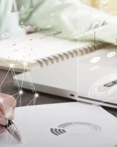 researcher working on data reports and graphs