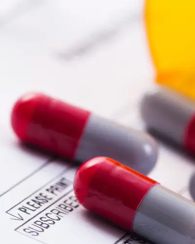 Prescription pills on an Rx pad