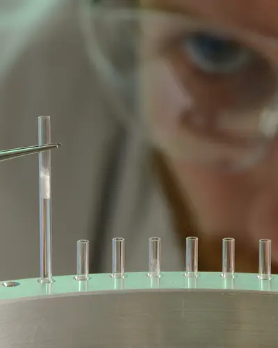 Lab worker using mass spectrometry